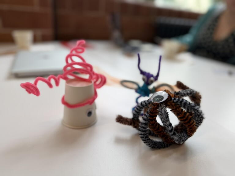 Two robot prototypes made from pipe cleaners