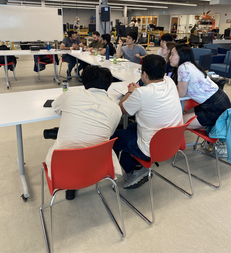 Students gathered around a table